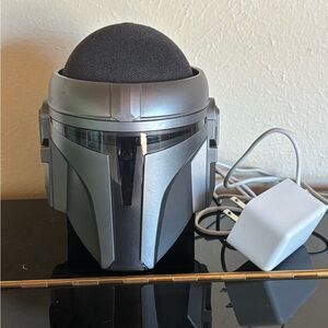 Amazon Echo Dot with Star Wars Mandalorian Helmet Stand